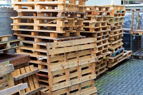 Delivery driver placing a skip at a property